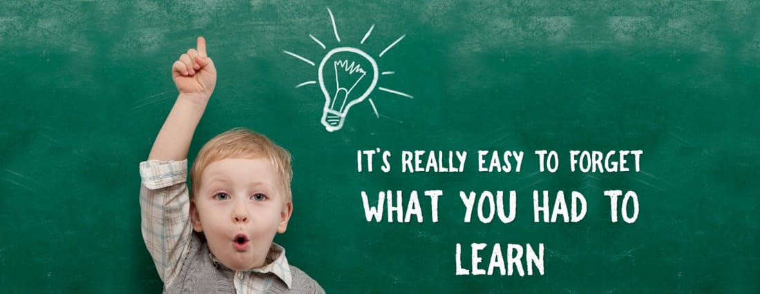 Picture of a boy with a lightbulb drawn on a chalk board